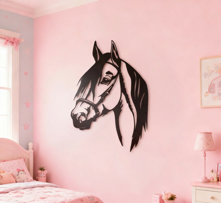 Black horse head wall decal on a pink wall in a child's bedroom.