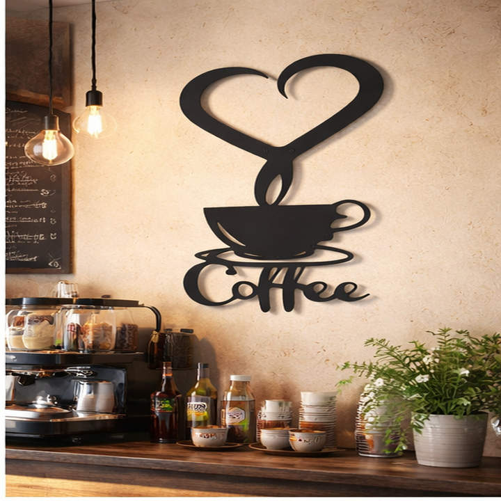 Decorative metal wall art of a coffee cup with a heart above it in a coffee shop setting.