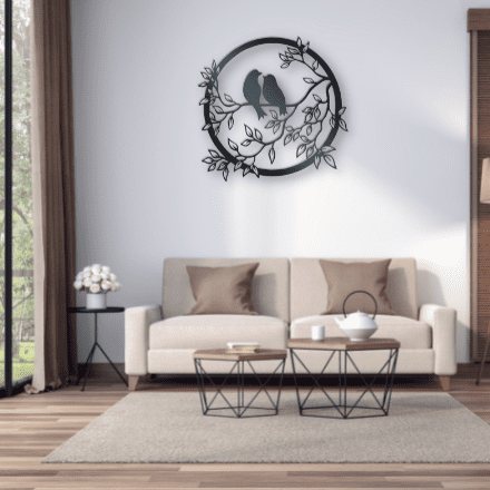 Metal Wall Art two birds siting on a branch looking at each other in a lovinq way with branches and leaves in a circular frame