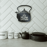 Metal wall decor of a tea pot with wording Good Morning its always tea time