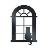 Metal wall decor showing a cat sitting and looking out of an arched window