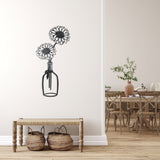 Metal wall decor of a Gerbera flower in a vase, showing great detail of the flower