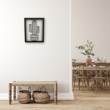 Metal wall art of a cacti in a frame, creates a fantastic 3D effect on the wall behind