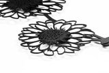 Metal wall decor of a Gerbera flower in a vase, showing great detail of the flower